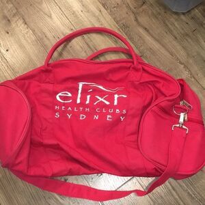 Red ELITE Elixr Sydney Australia Health club Carry Shoulder exercise duffle bag